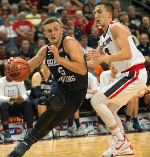 Rick Egan  |  The Salt Lake Tribune

Brigham Young Cougars guard Kyle Collinsworth (5) takes the ball past Gonzaga Bulldogs guard Kyle Dranginis (3), in the West Coast Conference Semifinals, The Brigham Young Cougars vs.The Gonzaga Bulldogs, at the Orleans Arena in Las Vegas, Saturday, March 7, 2016.