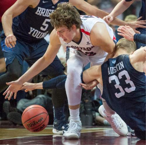 Rick Egan  |  The Salt Lake Tribune

Brigham Young Cougars forward Nate Austin (33) tries to get the ball way from Gonzaga Bulldogs forward Kyle Wiltjer (33) in the final seconds of the game, in the West Coast Conference Semifinals,  BYU vs. Gonzaga, at the Orleans Arena in Las Vegas, Saturday, March 7, 2016.