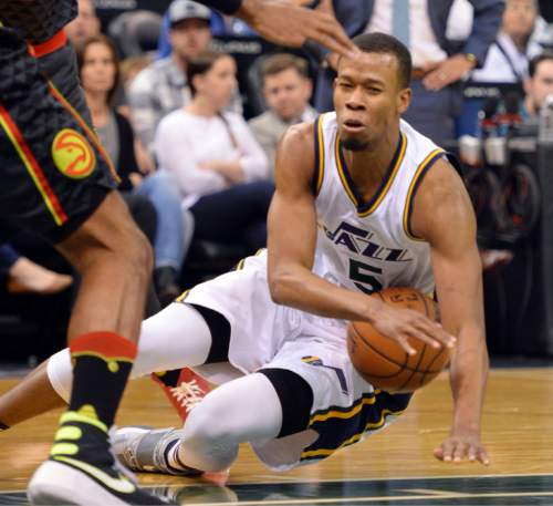 Steve Griffin  |  The Salt Lake Tribune


Utah Jazz guard Rodney Hood (5) gets knocked to the court during the Jazz Hawks NBA game at Vivint Smart Home Arena in Salt Lake City, Tuesday, March 8, 2016.