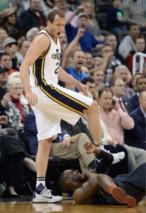 Steve Griffin  |  The Salt Lake Tribune


Utah Jazz forward Joe Ingles (2) screams his excitement as the steps over Atlanta Hawks guard Tim Hardaway Jr. (10) after Hardaway fouled him on a three pointer giving Ingles four point play during the Jazz Hawks NBA game at Vivint Smart Home Arena in Salt Lake City, Tuesday, March 8, 2016.