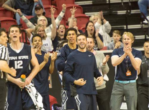 Rick Egan  |  The Salt Lake Tribune

Utah State Aggies cheer as at their team gets off to an early 18 point lead in the first half, in the Mountain West Conference playoff action, at the Thomas & Mack Center, in Las Vegas, Wednesday, March 8, 2016.