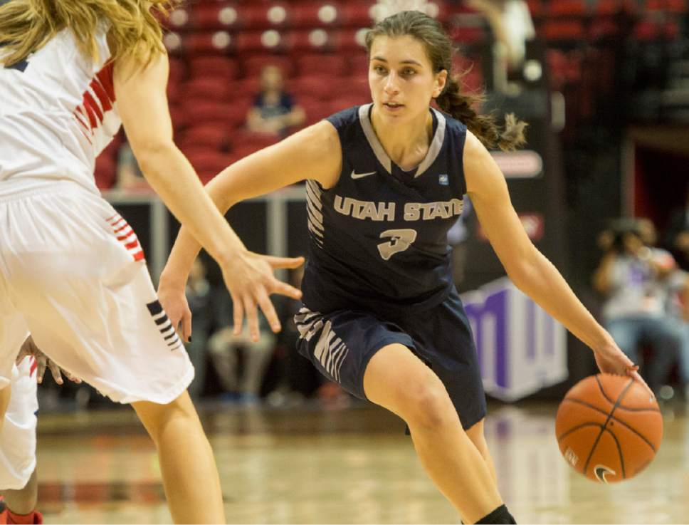 Rick Egan  |  The Salt Lake Tribune

Utah State Aggies guard/forward Funda Nakkasoglu (3) brings the ball down court, in the Mountain West Conference playoff action, The Utah State Aggies vs. The Fresno State Bulldogs, at the Thomas & Mack Center, in Las Vegas, Tuesday, March 8, 2016.