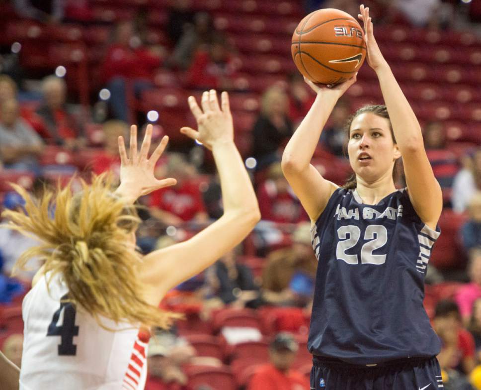 Rick Egan  |  The Salt Lake Tribune


Utah State Aggies forward Tijana Djukic (22) shoots over Fresno State Bulldogs center Bego Faz Davalos (4), in Mountain West Conference playoff action, The Utah State Aggies vs. The Fresno State Bulldogs, at the Thomas & Mack Center, in Las Vegas, Tuesday, March 8, 2016.