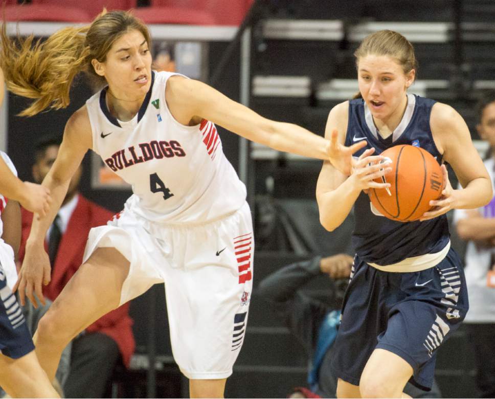 Rick Egan  |  The Salt Lake Tribune

Fresno State Bulldogs center Bego Faz Davalos (4) tries to tip the ball from Utah State Aggies guard Katie Toole (31) heads down court, in Mountain West Conference playoff action, The Utah State Aggies vs. The Fresno State Bulldogs, at the Thomas & Mack Center, in Las Vegas, Tuesday, March 8, 2016.