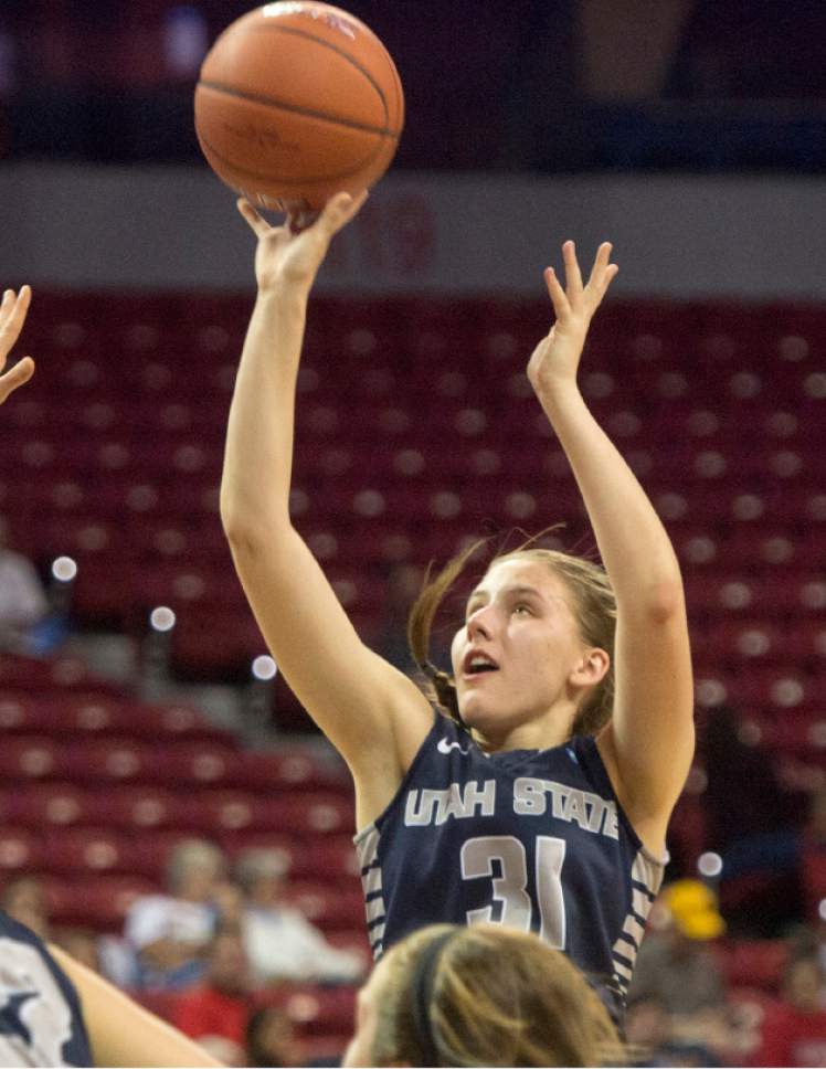 Rick Egan  |  The Salt Lake Tribune

Utah State Aggies guard Katie Toole (31) takes a shot, in Mountain West Conference playoff action, The Utah State Aggies vs. The Fresno State Bulldogs, at the Thomas & Mack Center, in Las Vegas, Tuesday, March 8, 2016.