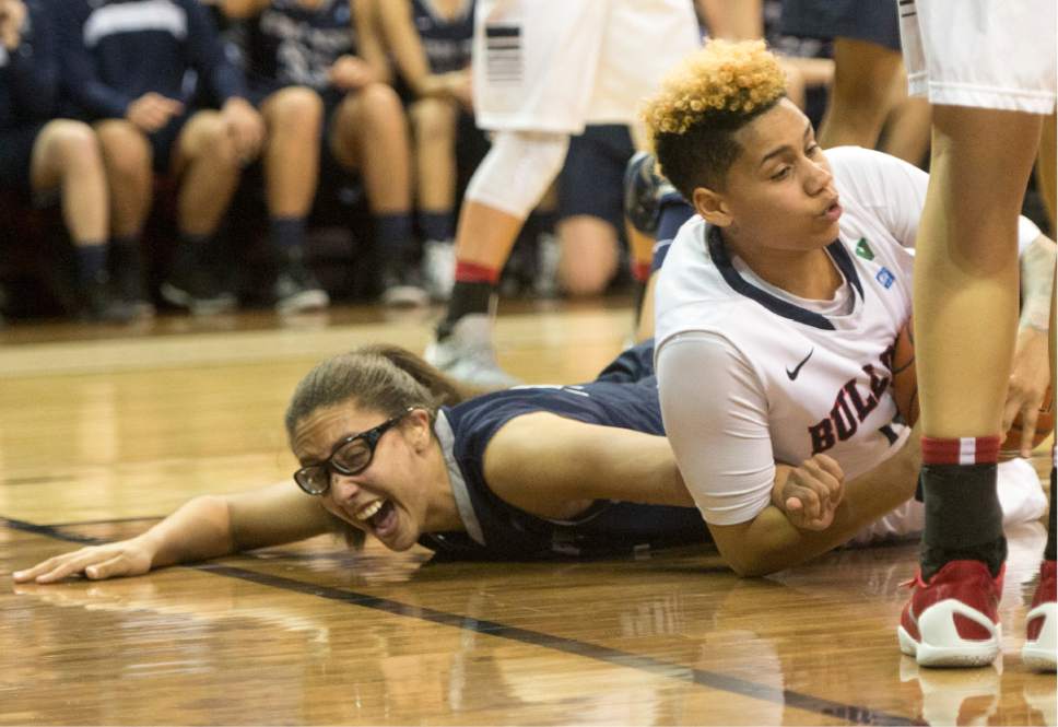 Rick Egan  |  The Salt Lake Tribune

Utah State Aggies center Deja Mason (44) grimaces as Fresno State Bulldogs guard Moriah Faulk (0) lays on her arm, in the Mountain West Conference playoff action, The Utah State Aggies vs. The Fresno State Bulldogs, at the Thomas & Mack Center, in Las Vegas, Tuesday, March 8, 2016.