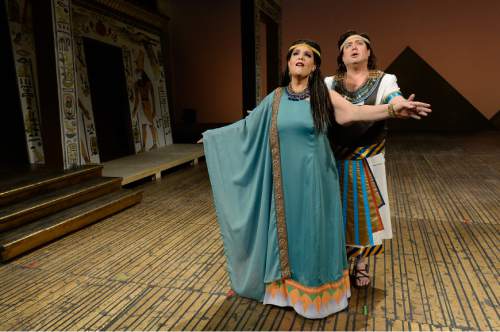 Francisco Kjolseth | The Salt Lake Tribune
Members of Utah Opera's production of "Aida" gather on set in costumes, wigs and makeup, including Jennifer Check (Aida, the captive Ethiopian princess) and Marc Heller (Radamès, the Egyptian soldier).