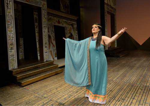 Francisco Kjolseth | The Salt Lake Tribune
Members of Utah Opera's production of "Aida" gather on set in costumes, wigs and makeup, including Jennifer Check (Aida, the captive Ethiopian princess).