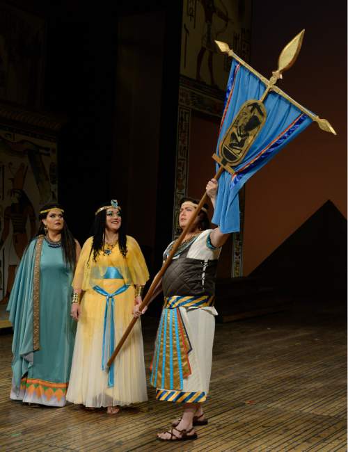 Francisco Kjolseth | The Salt Lake Tribune
Members of Utah Opera's production of "Aida" gather on set in costumes, wigs and makeup. They are Jennifer Check (Aida, the captive Ethiopian princess), left, Katharine Goeldner (Amneris, the Egyptian princess) and Marc Heller (Radamès, the Egyptian soldier both women are interested in).
