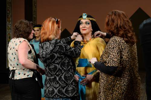 Francisco Kjolseth | The Salt Lake Tribune
Members of Utah Opera's production of "Aida" gather on set in costumes, wigs and makeup, including Katharine Goeldner (Amneris, the Egyptian princess) who is prepped for a photo shoot.