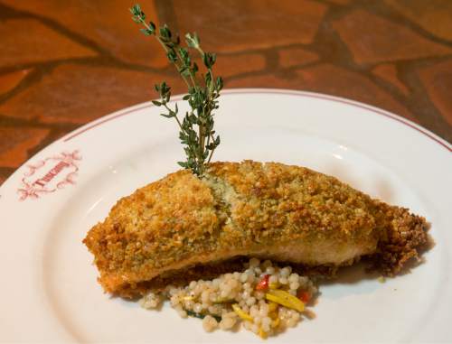 Rick Egan  |  The Salt Lake Tribune

Pecan-crusted salmon at Tuscany will be brought back to the menu as the restaurant celebrates its 20th anniversary by rolling out 1996 menu items and 1996 prices.