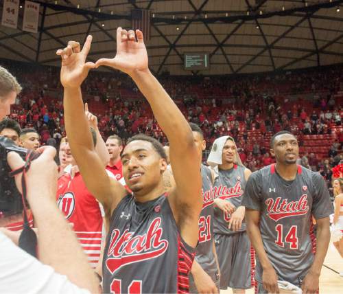 Rick Egan  |  The Salt Lake Tribune

Guard Brandon Taylor (11) celebrates  the Utes 57-55 win over Colorado, in Pac-12 basketball action at the Huntsman Center Saturday, March 5, 2016.