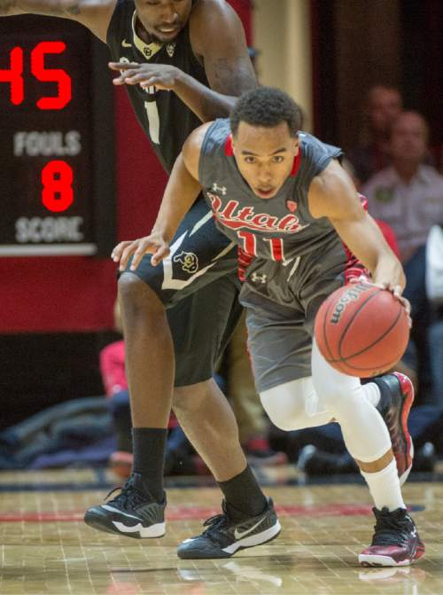 Rick Egan  |  The Salt Lake Tribune

Utah Utes guard Brandon Taylor (11) steals the ball from Colorado Buffaloes forward Wesley Gordon (1), in the final minutes of the game, as Utah defeated Colorado, 57-55, in Pac-12 basketball action at the Huntsman Center Saturday, March 5, 2016.