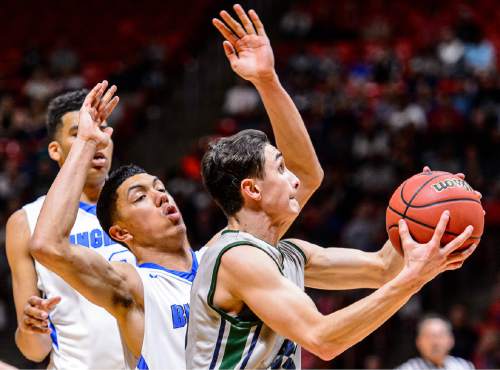 Trent Nelson  |  The Salt Lake Tribune
Copper Hills's Preston Sanchez (23) drives to the basket, with Bingham's Samuta Avea (32) defending as Copper Hills faces Bingham in the 5A state championship high school basketball game at the Huntsman Center in Salt Lake City, Saturday March 5, 2016.