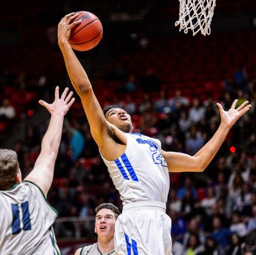 Trent Nelson  |  The Salt Lake Tribune
Bingham's Yoeli Childs (22) pulls down a rebound, over Copper Hills's Porter Hawkins (11)  as Copper Hills faces Bingham in the 5A state championship high school basketball game at the Huntsman Center in Salt Lake City, Saturday March 5, 2016.