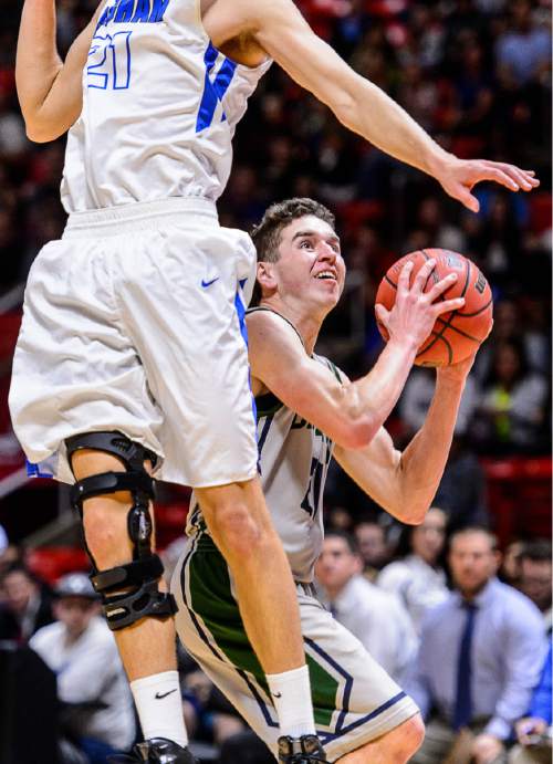 Trent Nelson  |  The Salt Lake Tribune
Copper Hills's Charlie Olsen (21) looks for the shot, with Bingham's Schyler Shoemaker (21) in front as Copper Hills faces Bingham in the 5A state championship high school basketball game at the Huntsman Center in Salt Lake City, Saturday March 5, 2016.