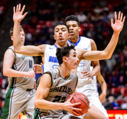Trent Nelson  |  The Salt Lake Tribune
Copper Hills's Preston Sanchez (23) drives to the basket, with Bingham's Samuta Avea (32) defending as Copper Hills faces Bingham in the 5A state championship high school basketball game at the Huntsman Center in Salt Lake City, Saturday March 5, 2016.