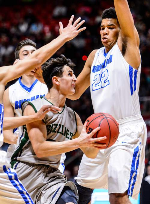 Trent Nelson  |  The Salt Lake Tribune
Copper Hills's Preston Sanchez (23) drives to the basket, with Bingham's Samuta Avea (32) defending as Copper Hills faces Bingham in the 5A state championship high school basketball game at the Huntsman Center in Salt Lake City, Saturday March 5, 2016.
