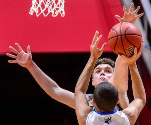 Trent Nelson  |  The Salt Lake Tribune
Copper Hills's Stockton Shorts (12) blocks a shot by Bingham's Dason Youngblood (4), as Copper Hills faces Bingham in the 5A state championship high school basketball game at the Huntsman Center in Salt Lake City, Saturday March 5, 2016.
