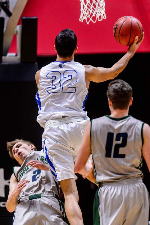 Trent Nelson  |  The Salt Lake Tribune
Copper Hills's Trevor Hoffman (2) takes the charge, as Bingham's Samuta Avea (32) shoots as Copper Hills faces Bingham in the 5A state championship high school basketball game at the Huntsman Center in Salt Lake City, Saturday March 5, 2016.