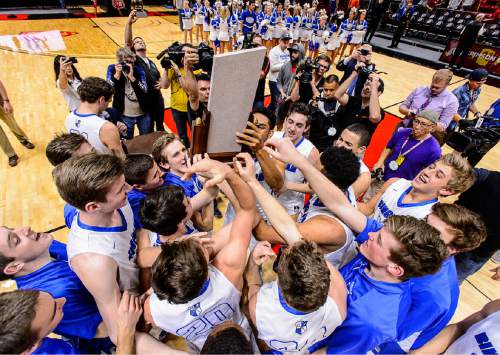 Trent Nelson  |  The Salt Lake Tribune
Bingham players celebrate their state championship after defeating Copper Hills in the 5A state championship high school basketball game at the Huntsman Center in Salt Lake City, Saturday March 5, 2016.