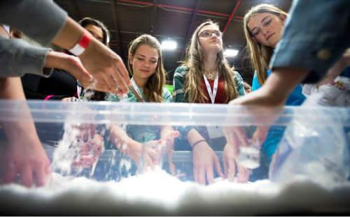 Steve Griffin  |  The Salt Lake Tribune

Girls learn about super absorbent polymers that, when exposed to water, can expand to 100 times their size on Friday. More than 1,000 high school-age girls attended the 3rd annual SheTech Explorer Day at UVU in Orem on Friday, March 11, 2016. The event promotes STEM education.