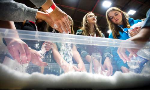 Steve Griffin  |  The Salt Lake Tribune

Girls learn about super absorbent polymers that, when exposed to water, can expand to 100 times their size on Friday. More than 1,000 high school-age girls attended the 3rd annual SheTech Explorer Day at UVU in Orem on Friday, March 11, 2016. The event promotes STEM education.