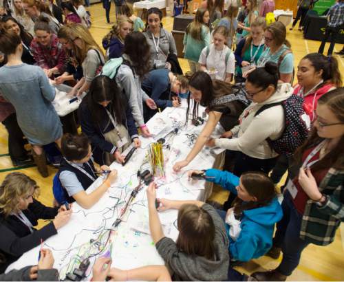 Steve Griffin  |  The Salt Lake Tribune

Girls try their hands with a 3-D pen during the third annual SheTech Explorer Day at UVU in Orem on Friday, March 11, 2016. More than 1,000 high school-age girls attended the event, which promotes STEM education.