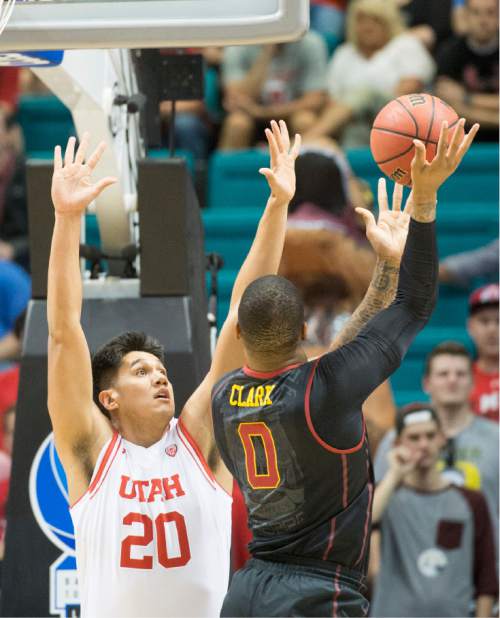 Rick Egan  |  The Salt Lake Tribune

USC Trojans forward Darion Clark (0) shoots as Utah Utes forward Chris Reyes (20) defends,  in PAC-12 Basketball Championship action, The Utah Utes vs. The USC Trojans, at the MGM Arena, in Las Vegas, Thursday, March 10, 2016.