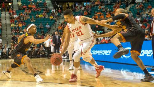 Rick Egan  |  The Salt Lake Tribune

Utah Utes forward Jordan Loveridge (21) cuts through the Trojan defenders, in PAC-12 Basketball Championship action, as Utah defeated USC Trojans 80-72, at the MGM Arena, in Las Vegas, Thursday, March 10, 2016.