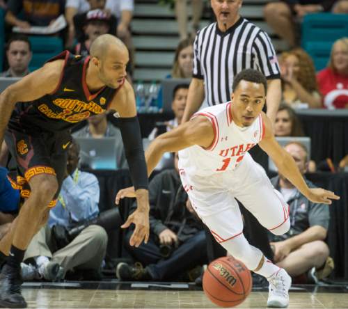 Rick Egan  |  The Salt Lake Tribune

Utah Utes guard Brandon Taylor (11) steals the ball from USC Trojans guard Julian Jacobs (12), in PAC-12 Basketball Championship action, as Utah defeated USC Trojans 80-72, at the MGM Arena, in Las Vegas, Thursday, March 10, 2016.