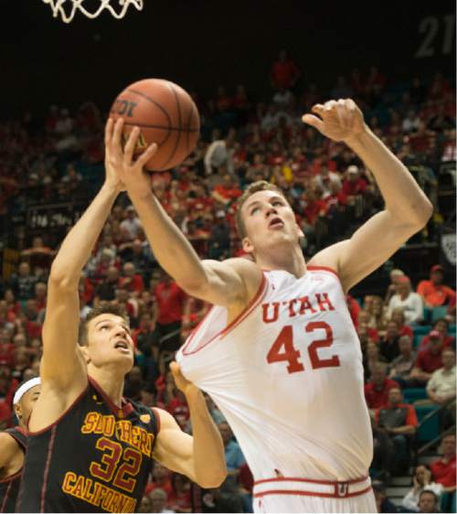 Rick Egan  |  The Salt Lake Tribune

USC Trojans forward Nikola Jovanovic (32) grabs the jersey as he tries to stop Utah Utes forward Jakob Poeltl (42) from scoring, in PAC-12 Basketball Championship action, as Utah defeated USC Trojans 80-72, at the MGM Arena, in Las Vegas, Thursday, March 10, 2016.