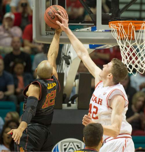Rick Egan  |  The Salt Lake Tribune

Utah Utes forward Jakob Poeltl (42) blocks a shot by USC Trojans guard Julian Jacobs (12), in PAC-12 Basketball Championship action, as Utah defeated USC Trojans 80-72, at the MGM Arena, in Las Vegas, Thursday, March 10, 2016.