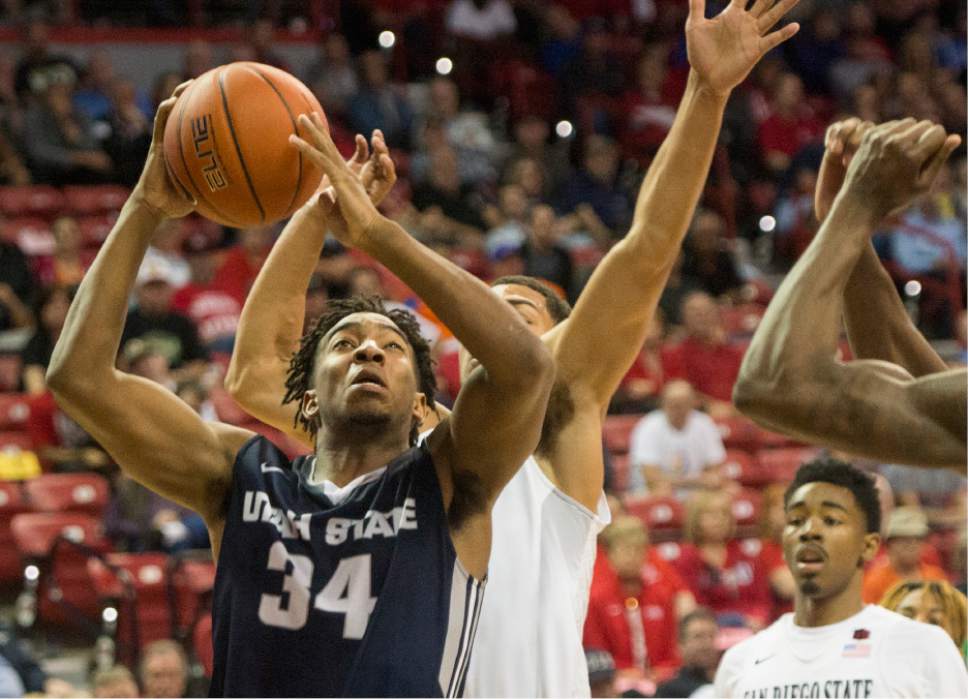 Rick Egan  |  The Salt Lake Tribune

Utah State Aggies guard Chris Smith (34) goes to the hoop, in Mountain West Tournament action, The Utah State Aggies vs. San Diego State Aztecs, at the Thomas and Mack Center in Las Vegas, Thursday, March 10, 2016.