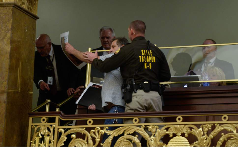 Francisco Kjolseth | The Salt Lake Tribune
Randy Gardner disrupts the House chamber to protest the firing squad on Thursday, March 10, 2016. SB189 would have abolished the death penalty in Utah. Gardner's brother Ronnie Lee Gardner was executed by firing squad in Utah in 2010.