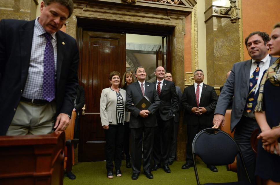 Francisco Kjolseth | The Salt Lake Tribune
Gov. Gary Herbert and his wife Jeanette are joined by Lt. Gov. Spencer Cox and his wife Abby as they enter the House of Representatives at the Utah Capitol following the conclusion of the session at midnight on Thursday, March 10, 2016.