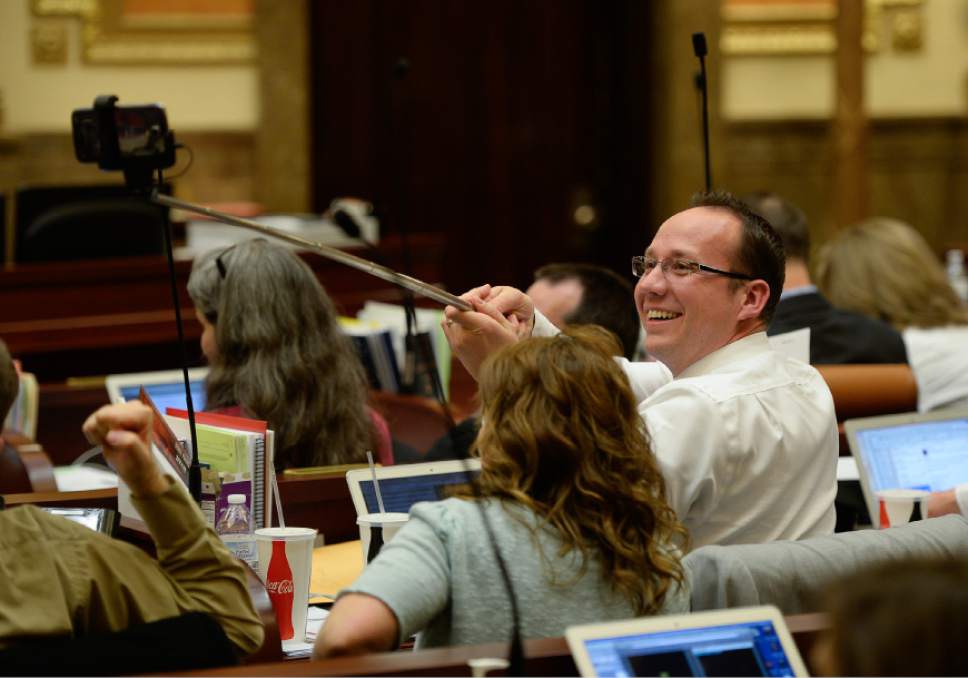 Francisco Kjolseth | The Salt Lake Tribune
Rep. Justin Fawson, R-North Ogden, uses a selfie stick to document the conclusion of the legislative session on Thursday, March 10, 2016.