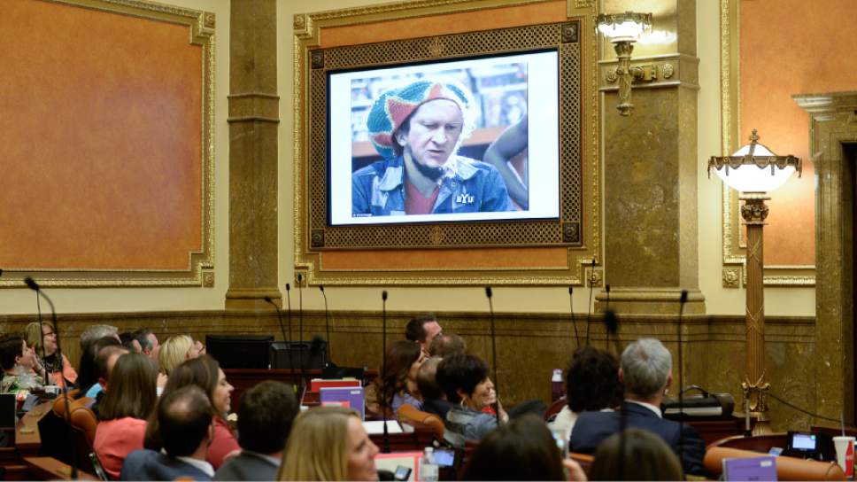 Francisco Kjolseth | The Salt Lake Tribune
An image of Senator Mark Madsen, R-Saratoga Springs, dressed as a Rastafarian flashes on the screen in reference to his marijuana bill. The slide show was part of a song played by representatives to the tune of Sweet Home Alabama following the conclusion of the session on Thursday, March 10, 2016.