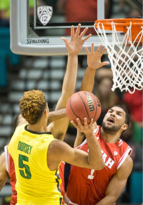 Rick Egan  |  The Salt Lake Tribune

Oregon Ducks guard Tyler Dorsey (5) shoots per Utah Utes guard Isaiah Wright (1) in the PAC-12 Basketball Championship game, The Utah Utes vs.The Oregon Ducks, at the MGM Arena, in Las Vegas, Friday, March 12, 2016.