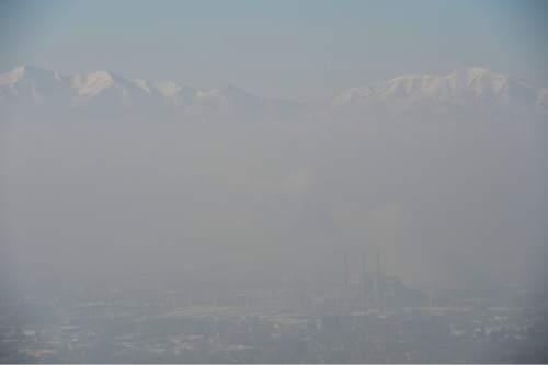 Francisco Kjolseth  |  The Salt Lake Tribune
The Salt Lake valley is obscured by pollution by a red-air day on Wednesday, Jan. 22, 2014.