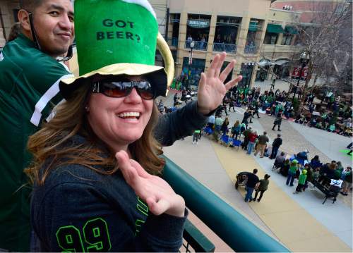 Scott Sommerdorf   |  The Salt Lake Tribune  
Brandy Nelson watched the 40th annual St. Patrick's Day organized by the Hibernian Society of Utah, from the upper level of The Gateway mall, Saturday, March 12, 2016.