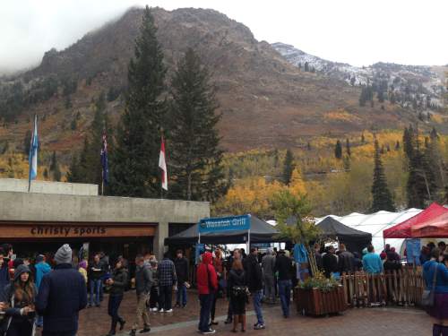 Rick Egan  |  Tribune file photo
Crowds brave the cold weather as they drink beer on the Snowbird Plaza, on the last day of the nine-week Oktoberfest celebration at Snowbird in October  2014.