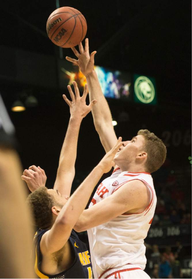 Rick Egan  |  The Salt Lake Tribune

Utah Utes forward Jakob Poeltl (42) scores over, California Golden Bears center Kameron Rooks (44), in PAC-12 Basketball Championship semi-finals, Utah Utes vs.The California Golden Bears, at the MGM Arena, in Las Vegas, Friday, March 11, 2016.