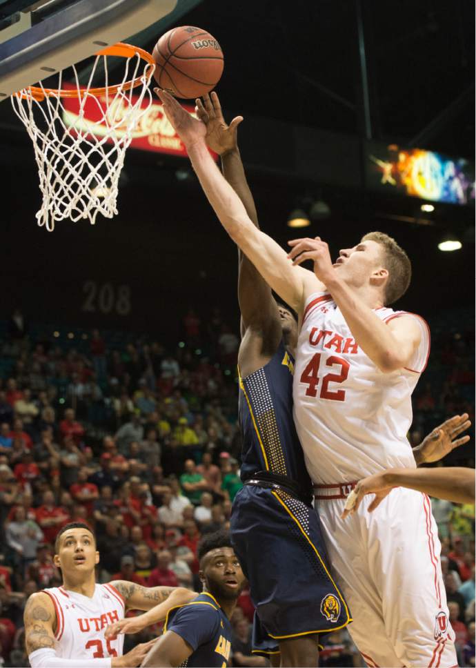 Rick Egan  |  The Salt Lake Tribune

Utah forward Jakob Poeltl (42) scores for the Utes in overtime,  in PAC-12 Basketball Championship semi-finals, Utah Utes vs.The California Golden Bears, at the MGM Arena, in Las Vegas, Friday, March 11, 2016.