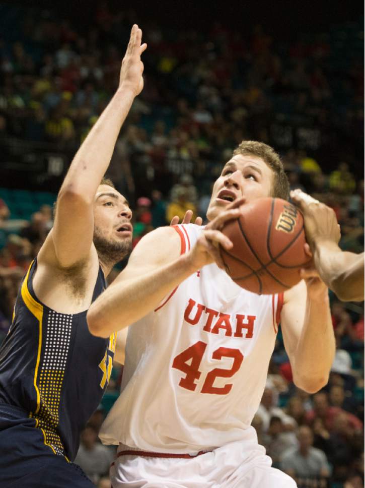 Rick Egan  |  The Salt Lake Tribune

Utah forward Jakob Poeltl (42) looks for a shot, as California Golden Bears center Kameron Rooks (44) defends, in PAC-12 Basketball Championship semi-finals, Utah Utes vs.The California Golden Bears, at the MGM Arena, in Las Vegas, Friday, March 11, 2016.