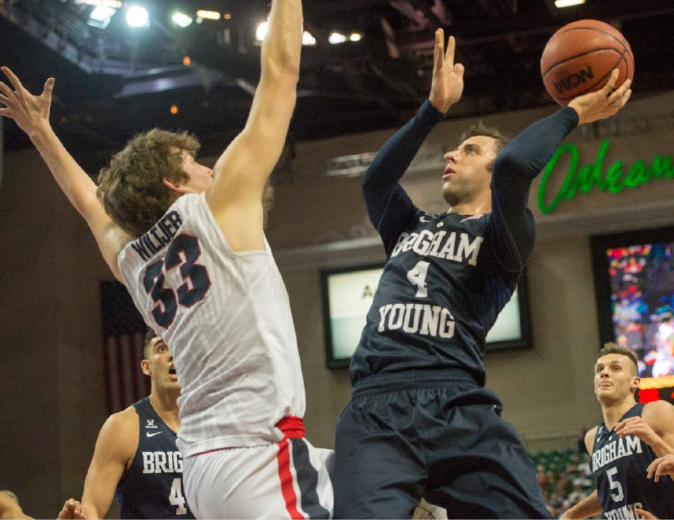 Rick Egan  |  The Salt Lake Tribune

Brigham Young Cougars guard Nick Emery (4) takes a shot, as Gonzaga Bulldogs forward Kyle Wiltjer (33) defends, in the West Coast Conference Semifinals, at the Orleans Arena in Las Vegas, Saturday, March 7, 2016.