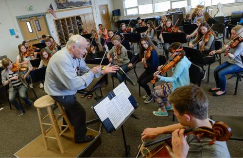 Francisco Kjolseth | The Salt Lake Tribune
Jack Ashton, former longtime Utah Symphony violinist, for more than 30 years, works with the Young Artist Chamber Players at Highland High recently. The youth orchestra is getting ready for a concert tour to Europe.