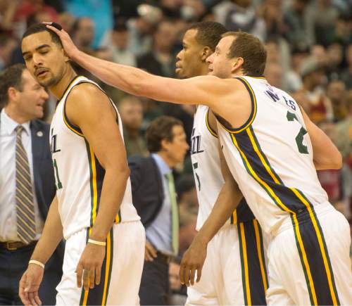 Rick Egan  |  The Salt Lake Tribune

Utah Jazz forward Joe Ingles (2) pats Utah Jazz forward Trey Lyles (41) on the head, after he got mixed up with Cleveland Cavaliers forward Channing Frye (9), both Lyles and Frye were ejected from the game, in NBA action, in Salt Lake City, Monday March 14, 2016.