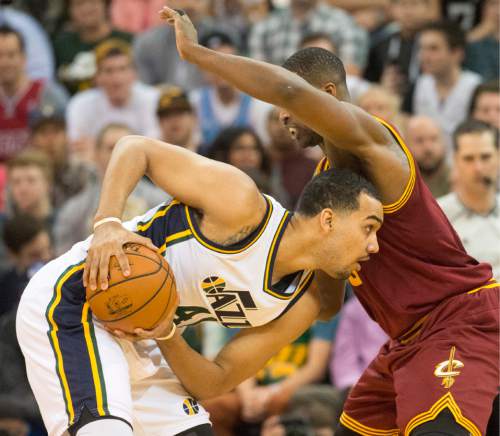 Rick Egan  |  The Salt Lake Tribune

Utah Jazz forward Trey Lyles (41) is guarded by Cleveland Cavaliers center Tristan Thompson (13), in NBA action, in Salt Lake City, Monday March 14, 2016.