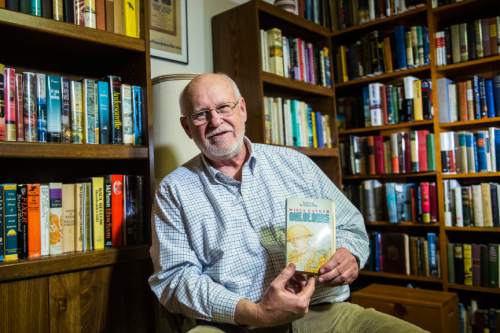 Chris Detrick  |  The Salt Lake Tribune
Retired BYU professor Richard Isakson poses for a portrait at his home in Provo in February 2016. Isakson collects and reads Pulitzer-winning novels.